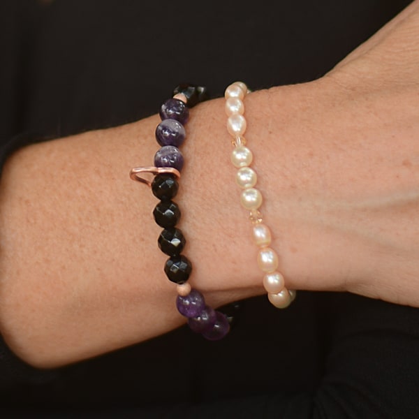 Semi-precious Gemstone Amethyst & Black Onyx Bracelet, 14KT Rose-Gold Open Heart Charm worn with Pearl & Crystal Pearl Bracelet,on wrist