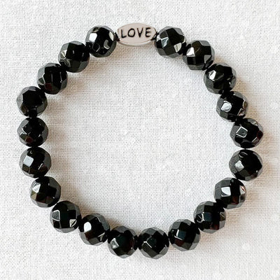Celebrate the strength and beauty of love! This delicate yet powerful bracelet adds a modish touch to any outfit. It’s ideal for layering with other bracelets or gorgeous when worn alone. Plus, its versatile design means you can dress it up for formal occasions or keep it casual for everyday looks. The Love and Strength Onyx Bracelet is the perfect way to show off your style and signify your power in love!
