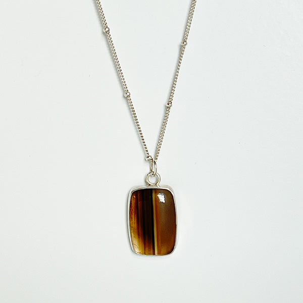 Close up of the Montana Agate Pendant. Handcrafted in California.