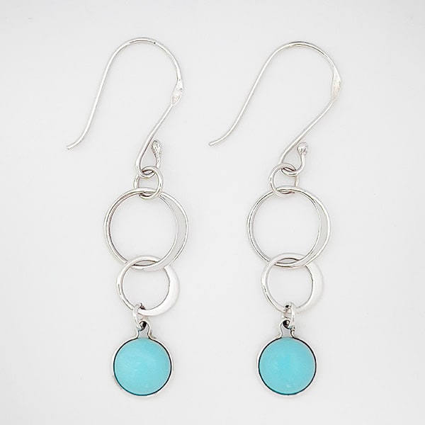 Elevate your style with these beautifully designed earrings. An intricate interlinking of sterling silver CIRCLES OF LIFE adds a touch of elegance to your everyday look. Wear them on their own or paired with your favorite sterling necklace to make a statement.