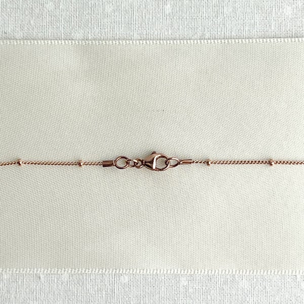 Delicate layering necklace in 14kt Rose Gold Filled; 16 inches. Clasp detail