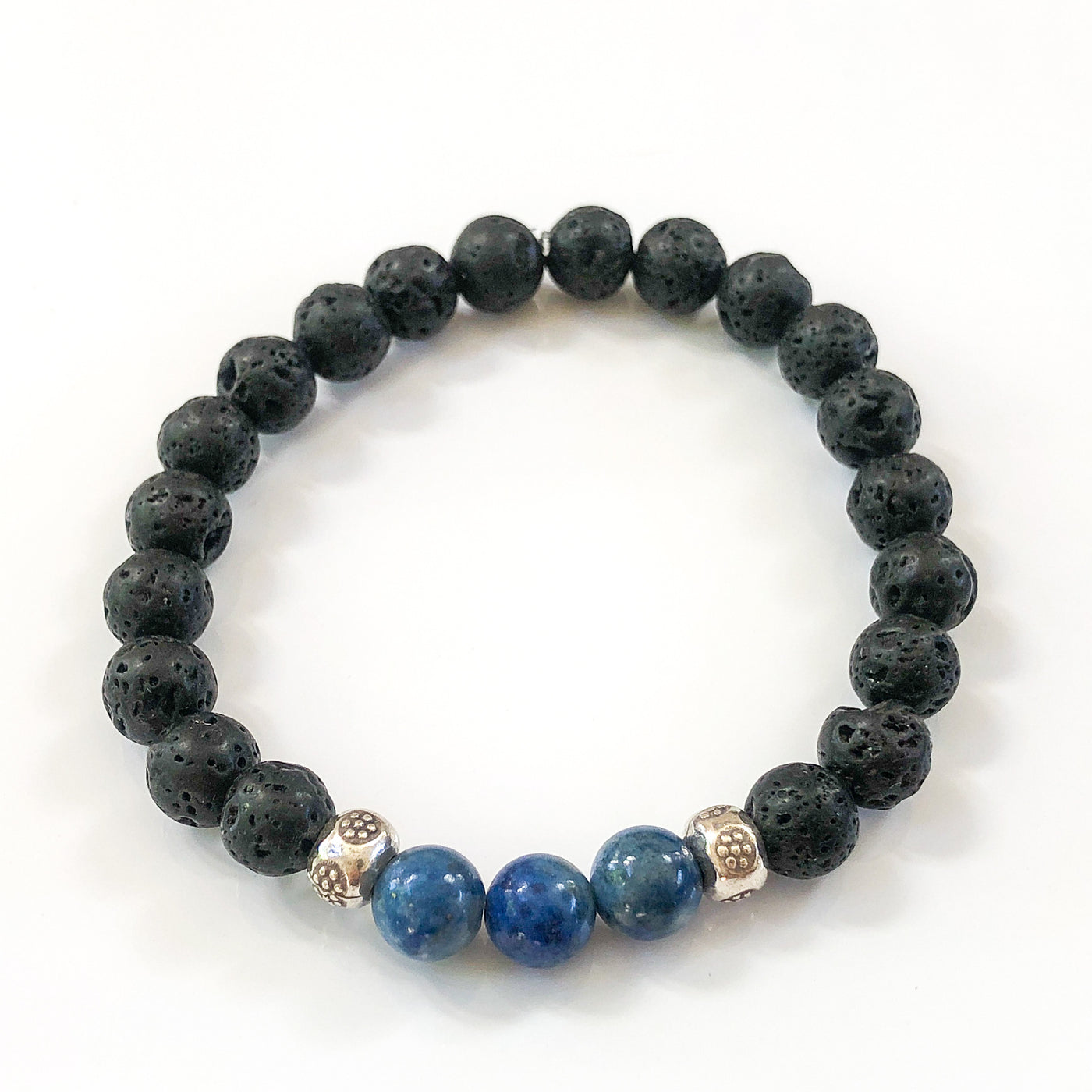Semi-precious Blue Denim Lapis & Lava Rock Beads in a stylish stretch bracelet to complement your T-shirt & jeans.  Handcrafted in CA.