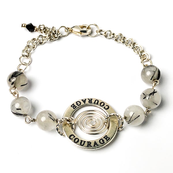 Wear your personal COURAGE affirmation near & dear. This highly polished sterling silver circle charm is engraved on both sides and the lovely spiral drop gives it some whimsey. Milky white quartz with striking black needle-like inclusions of black tourmaline.  Handcrafted in CA.