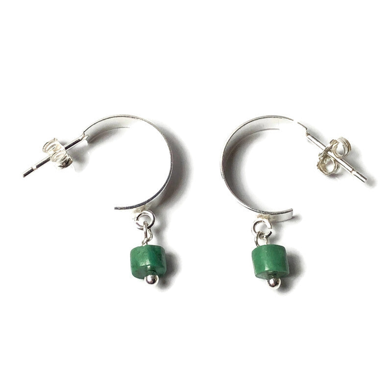 TURQUOISE-- get drawn by its beauty and its positivity - the small sea-green heishi beads create a color pop to these sterling silver half hoop ear studs. 