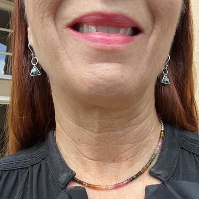 Ice Blue Larimar and Sterling Silver Triangle Drop Earrings worn on ears.