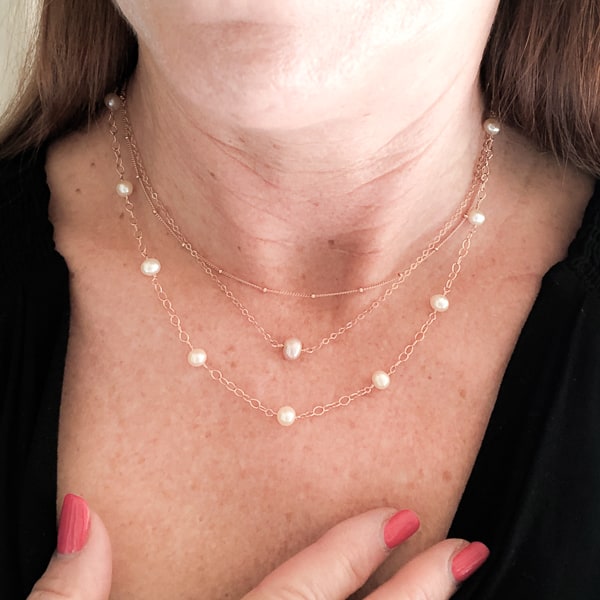 Delicate layering necklace in 14kt Rose Gold Filled; 16 inches. Shown layered with 2 pearl necklaces (not included)