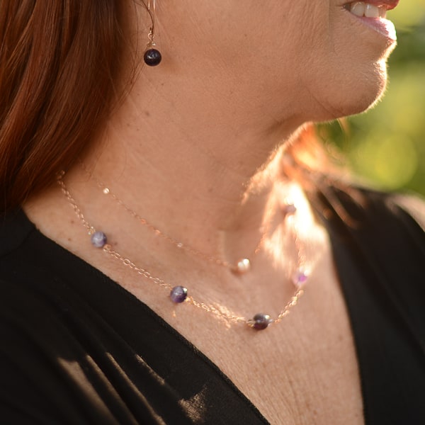 Amethyst Ombre Necklace worn with matching earrings and Pearl Layering Choker