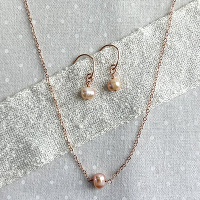 Delicate layering necklace with cultured freshwater pearl in 14kt Rose Gold Filled. Adjustable 14 to 16 inches, Shown with matching pearl earrings