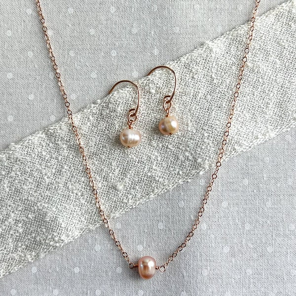 Delicate jewelry to wear every day or for simple elegance on a dinner date. Cultured Freshwater Pearl & 14kt Rose Gold-filled Earrings. Versatile to wear with this delicate layering necklace with cultured freshwater pearl in 14kt Rose Gold Filled.