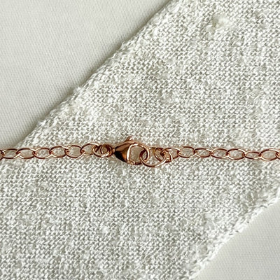 Delicate necklace with cultured freshwater pearls in 14kt Rose Gold Filled. Adjustable 16 to 18 inches, Clasp detail.