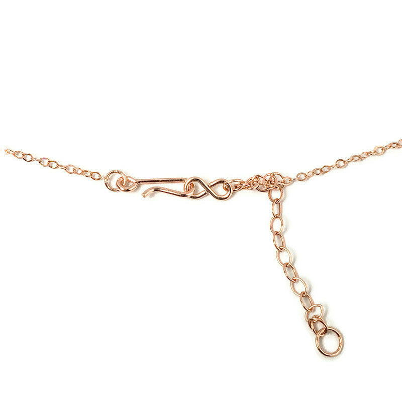Delicate genuine Ruby gemstone and 14Kt Rose Gold-filled bar necklace. Perfect alone or for layering. The shine of the Rose Gold stardust bead compliments the red rubies nicely and gives the necklace an air of sophistication. The queen of gems in a well-polished deep red and hand-cut rondelle shape. Clasp detail