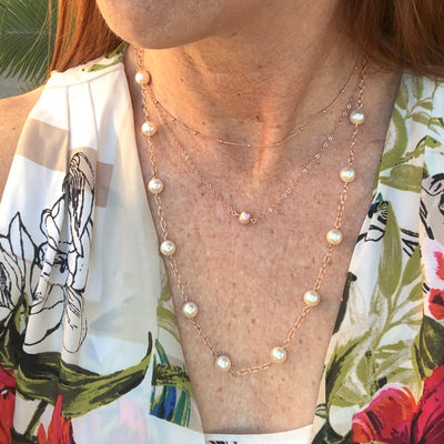 Inspired by the pearl and gold "gumball" necklace Madame VP- Kamala wears.  A faint golden-pink tone softens the white undertones of Swarovski 8mm crystal's light cream rose pearl, giving it a slightly vintage air. This subtle shade delivers a hint of shimmer and sophistication. Worn with layering necklaces - not included.
