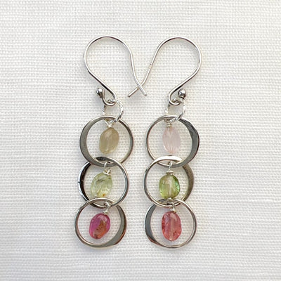 Tourmaline Chandelier Earrings. The translucent clear pink and green gems cascade beautifully in a chandelier style for a piece of wearable art. A very lightweight style that won't drag you down. Simple and Beautiful Elegance. Ear wire detail view.