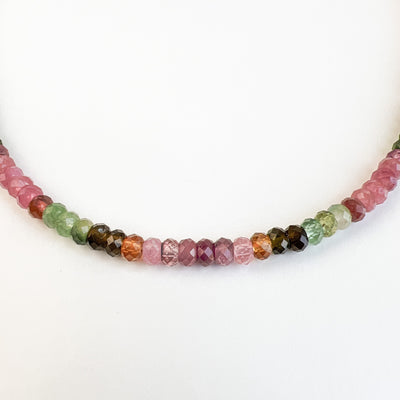 Discover the natural radiance and rainbow of colors of this tantalizing gemstone. Multicolored Tourmaline Sparkle Choker. Front detail view. Handcrafted in California.