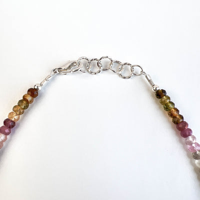 Discover the natural radiance and rainbow of colors of this tantalizing gemstone. Multicolored Tourmaline Sparkle Choker. Clasp detail view. Handcrafted in California.