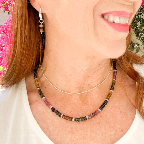 Discover the natural radiance and rainbow of colors of this tantalizing gemstone.   Stunning Tourmalines in raspberry pink, seafoam & forest green, and translucent amber colors. Elevate your casual Friday look with these lightweight earrings that shimmer in the sunlight. Shown worn with matching necklace.