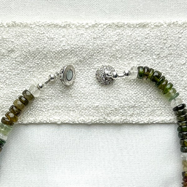Stunning Tourmalines framed by Rainbow Moonstones highlight the raspberry pink, seafoam & forest green, and translucent amber colors. Open Clasp Detail.
