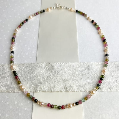 Are you a Pearl or a Gemstone gal? Have both with this Tourmaline and Pearl necklace. Wear to your next wedding event, date night with your partner, or business conference. You will turn heads with this stunner. Handcrafted in CA.