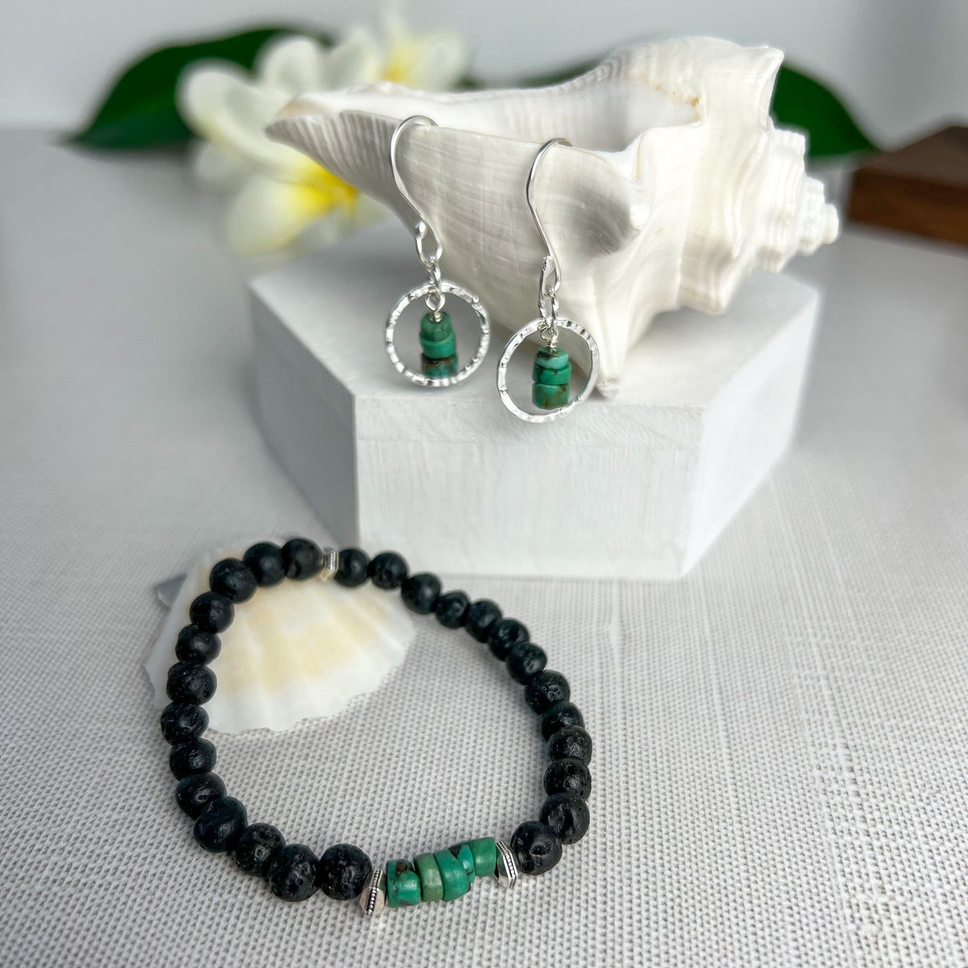 Delicate Heishi Yungai & Silver-plated 14mm hammered silver circles. Lightweight and graceful. Handcrafted in California Shown with Turquoise and Lava Bead Bracelet