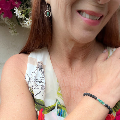 Delicate Heishi Yungai & Silver-plated 14mm hammered silver circles. Lightweight and graceful. Handcrafted in California Modeled with matching bracelet