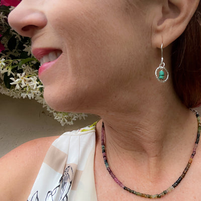 Delicate Heishi Yungai & Silver-plated 14mm hammered silver circles. Lightweight and graceful. Handcrafted in California Model with Necklace